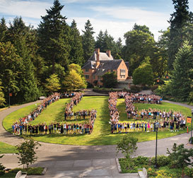 Photo of students on campus lawn. Link to Gifts That Pay You Income.