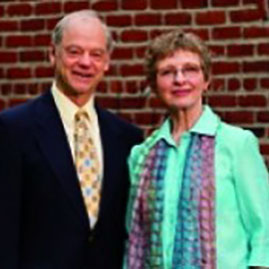 Photo of Donna Dermond M.A.T. ’89 and Kurt Wehbring M.A. ’92. Link to their story.